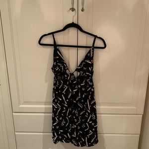Black and cream patterned strappy mini dress